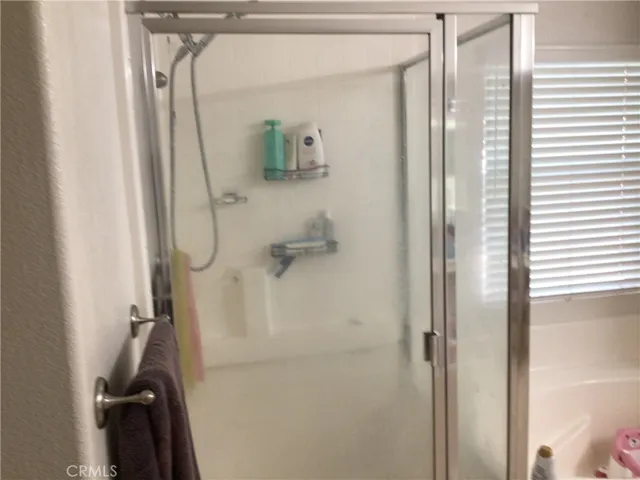 upstairs master bathroom shower and tub