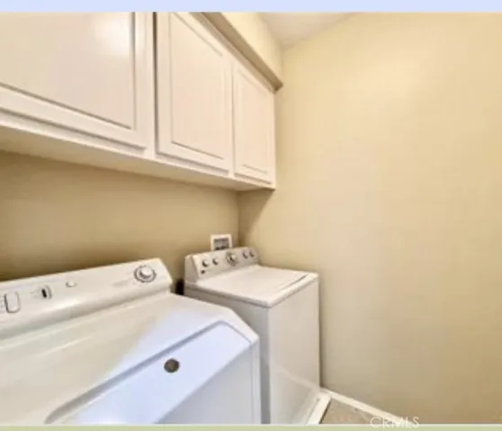 These replaced with new washer/dryer and new sink across.