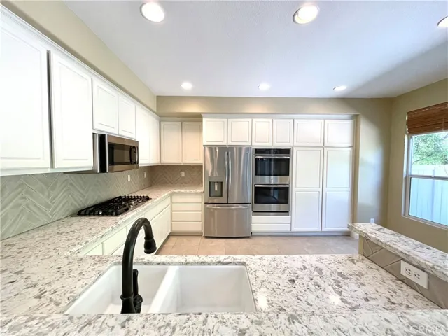 View of kitchen from bar