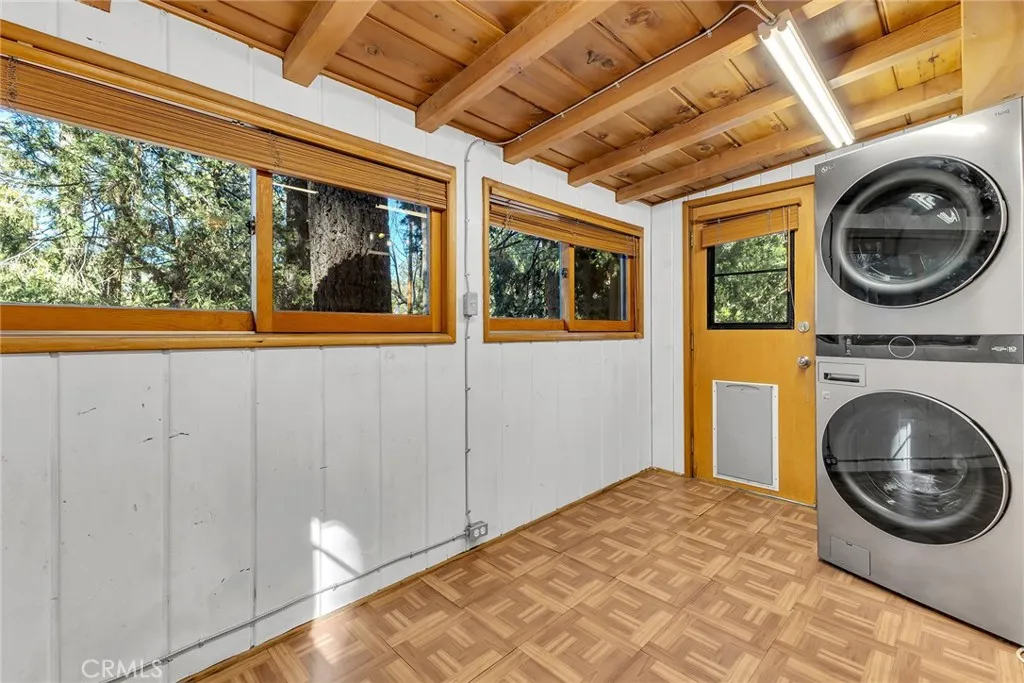 Laundry room with stacked washer / dryer