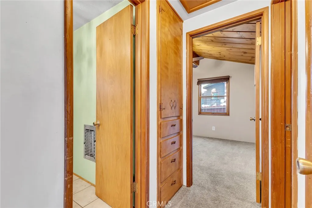 Notice the wooden built-in cabinets?