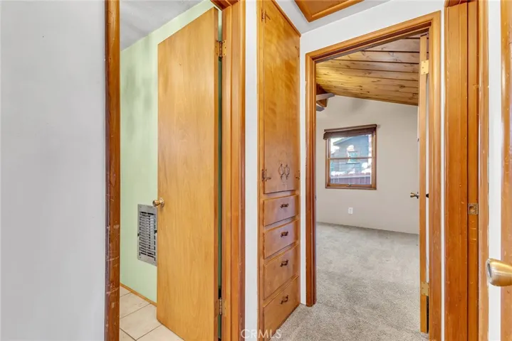 Notice the wooden built-in cabinets?
