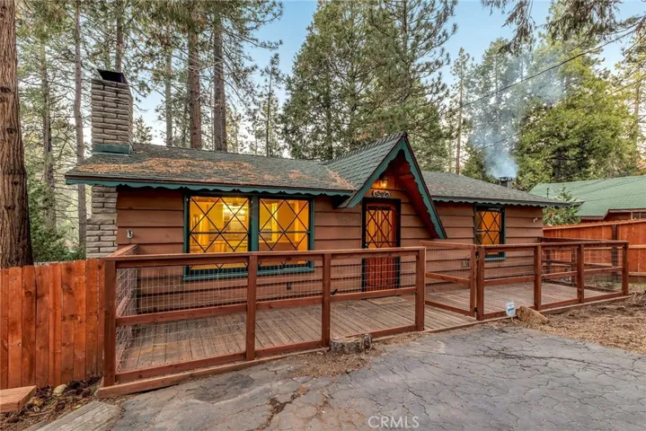 Smoke is rising from the neighbors warm winter fire!
