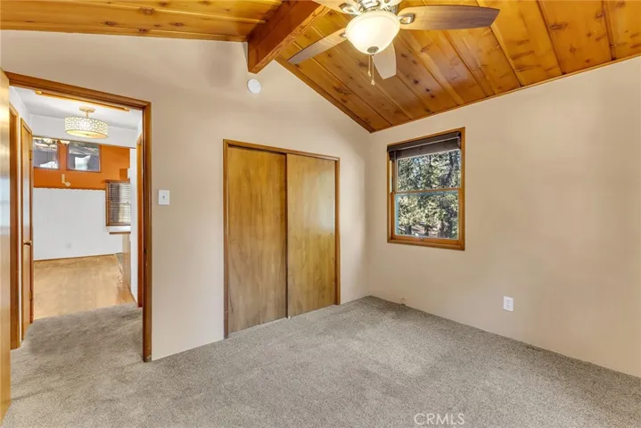 Love the high wooden ceilings in the bedrooms