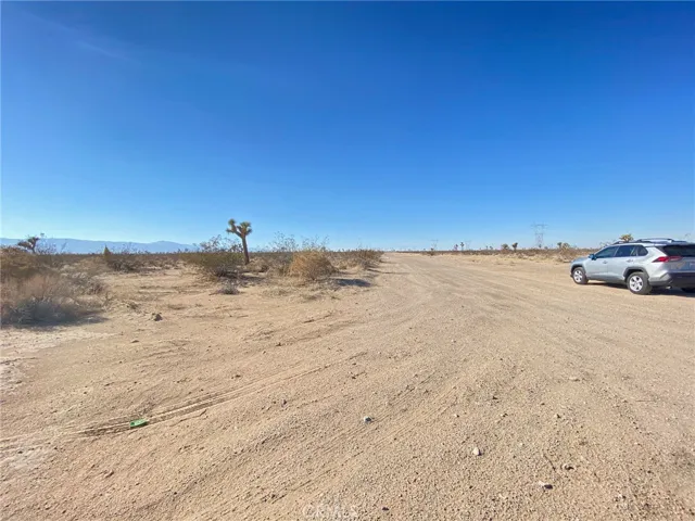 dirt road of extended West from existing Cassia Rd