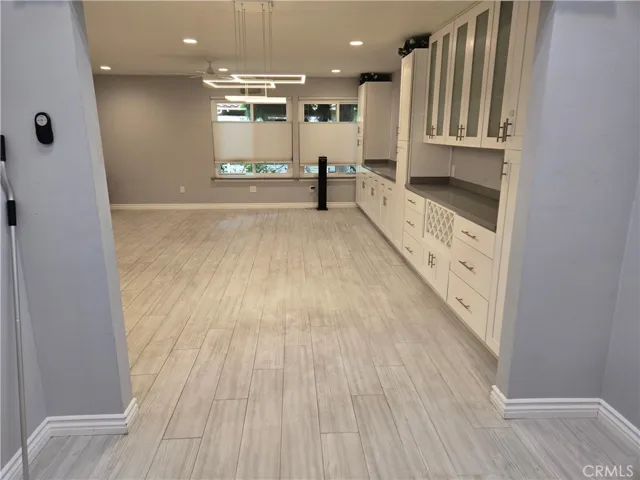 Inside den/atrium out to dining and living areas