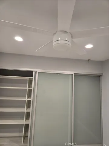 Custom lighting, fan and closet space in second bedroom