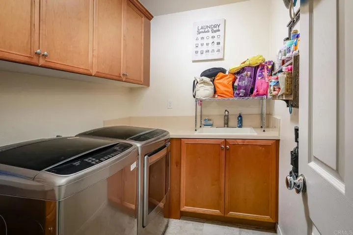 Laundry is downstairs, Sink, folding area and plenty of extra storage