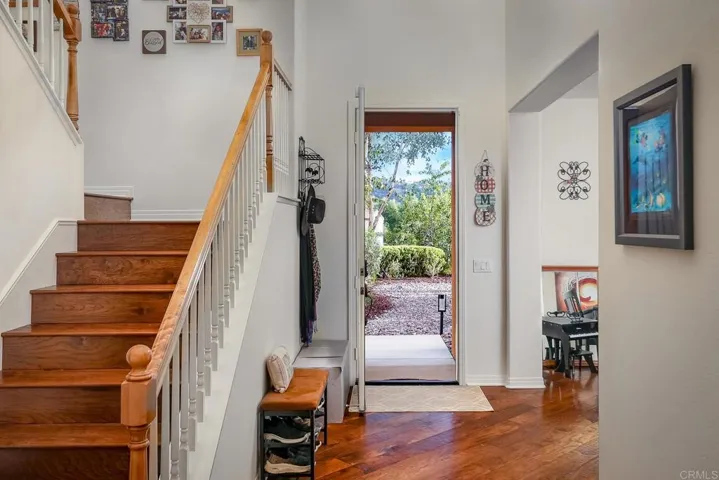 Grand entry featuring stunning Hardwood Flooring