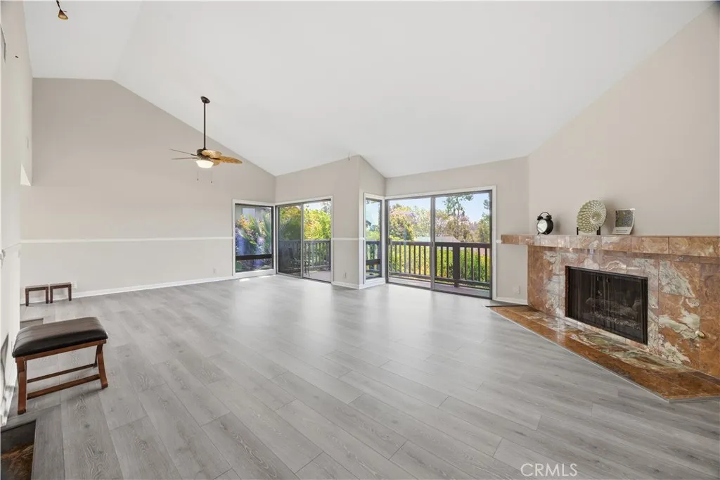 The original picture of the living room and dining room. Spacious with high ceiling and bright will 2 sets of sliding doors and 2 additional windows.