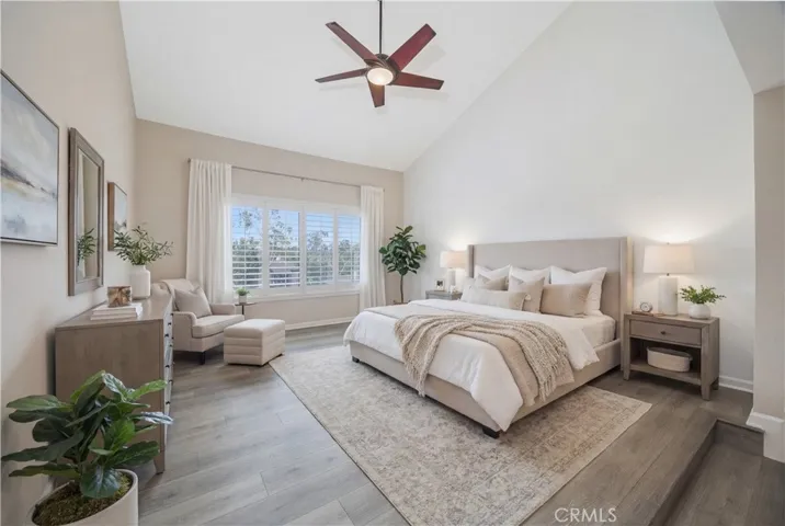 The spacious and bright primary bedroom with virtual staging. The view outside the oversized-window is gorgeous and pravite. Again, brand-new luxury flooring.