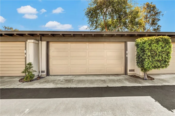 It has a two car detached garage with ample built-in shelves for storage.