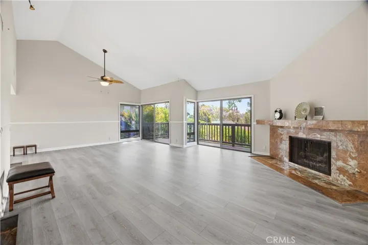 The original picture of the living room and dining room. Spacious with high ceiling and bright will 2 sets of sliding doors and 2 additional windows.