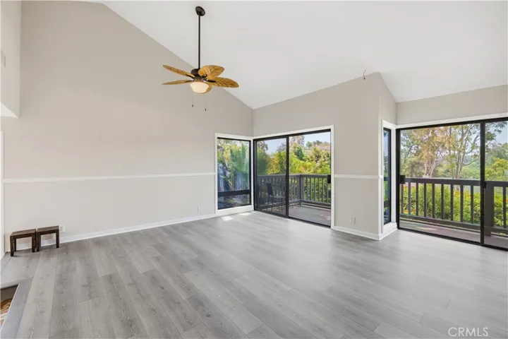 The nice dining room area with brand new ceiling fan/light.