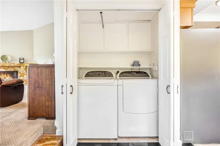 Washer and dryer are included inside a closet.