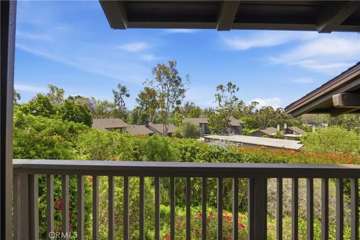 The beautiful view on the balcony outside the living room. very private. The handrailing was freshly painted not long ago by HOA.