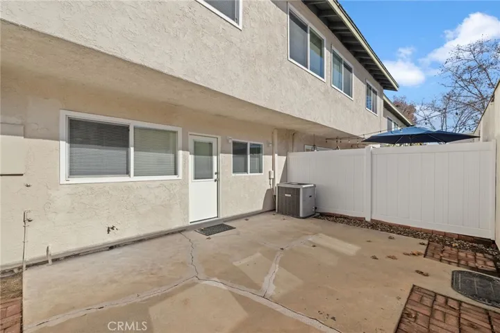 Outside Patio w/ Vinyl Fence