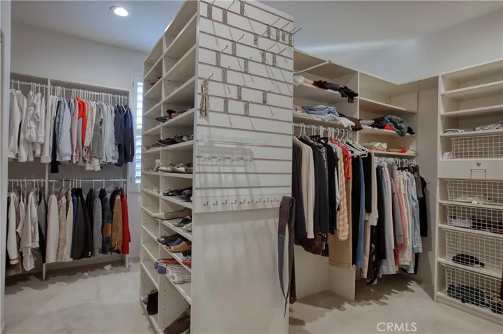 Bedroom 2 is currently used as an enormous walk-in closet