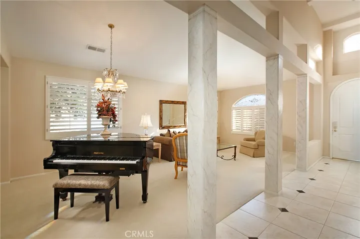 Formal Dining area being used for a piano