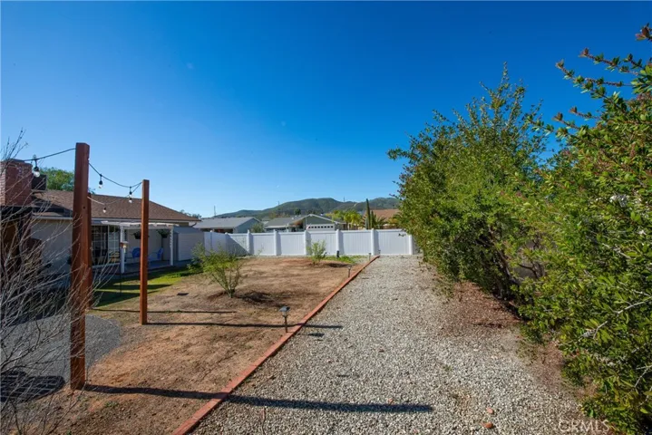 Huge back yard that could possibly be modified to accommodate R.V. parking with plenty of space left over for quality outdoor living and entertainment.