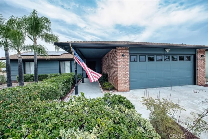 Extraordinary curb appeal. Big lush low maintenance corner lot. Brick accents.