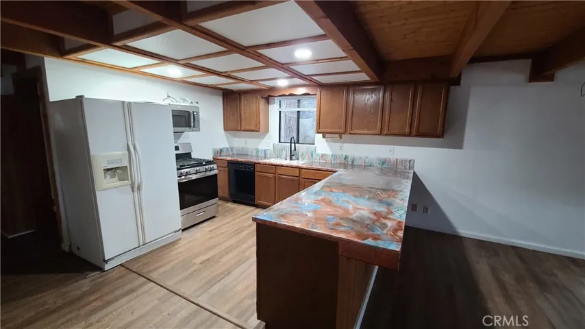 Unit A Kitchen with custom made countertops.