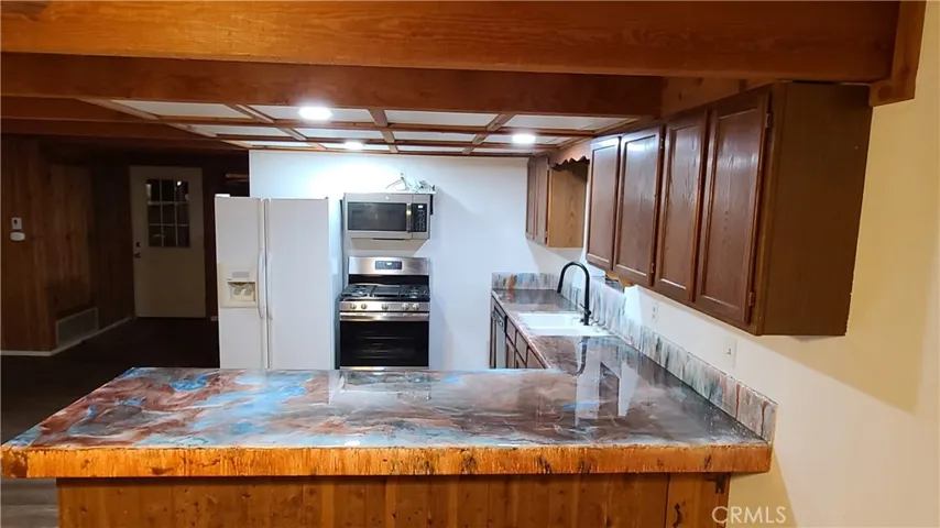 Unit B Kitchen with custom made countertops.