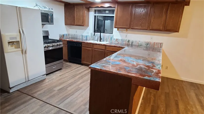 Unit B Kitchen with custom made countertops.