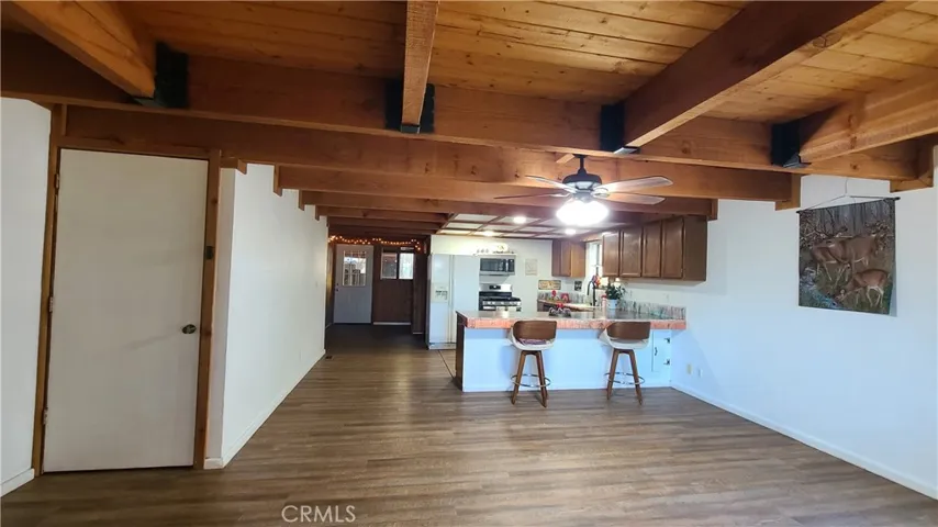 Unit B Living room facing Kitchen