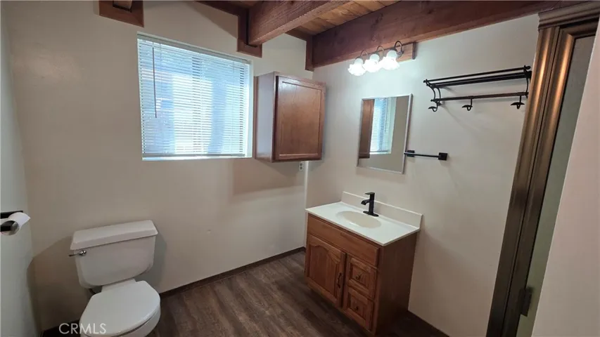 Unit A Downstairs Bathroom off of Kitchen.