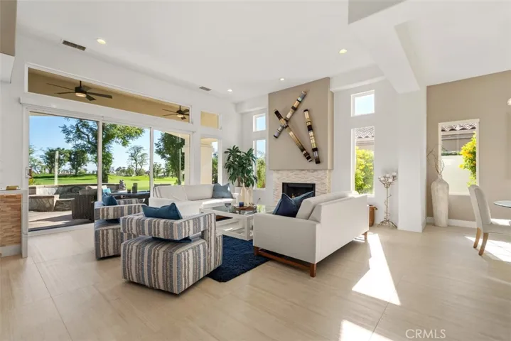 Living room open to Golf course and amazing view