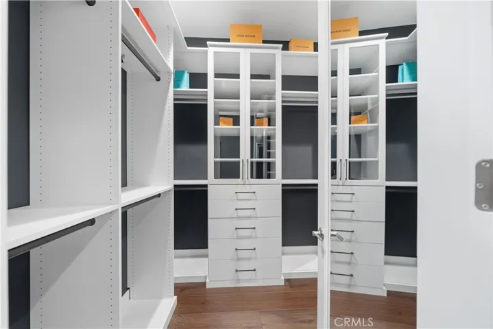Beautifully built custom walk in closets in primary suite