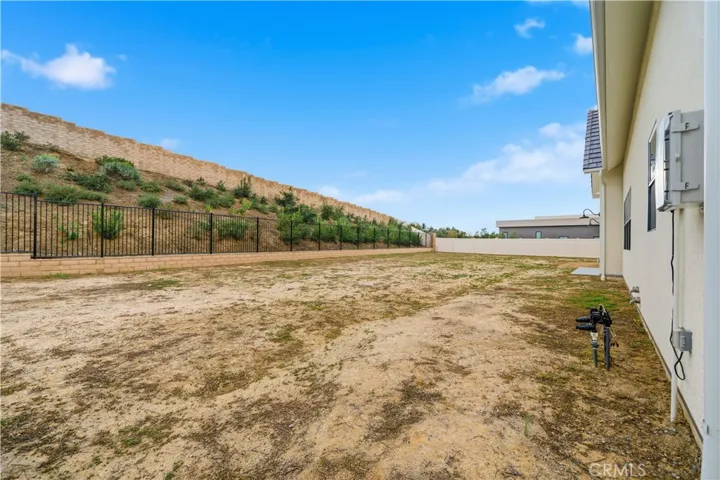 Large back yard is ready to be your private oasis!