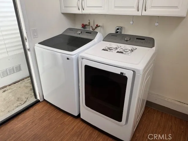Washer dryer in a separate structure in the carport. Tons of space here for a pantry, folding counter, etc.