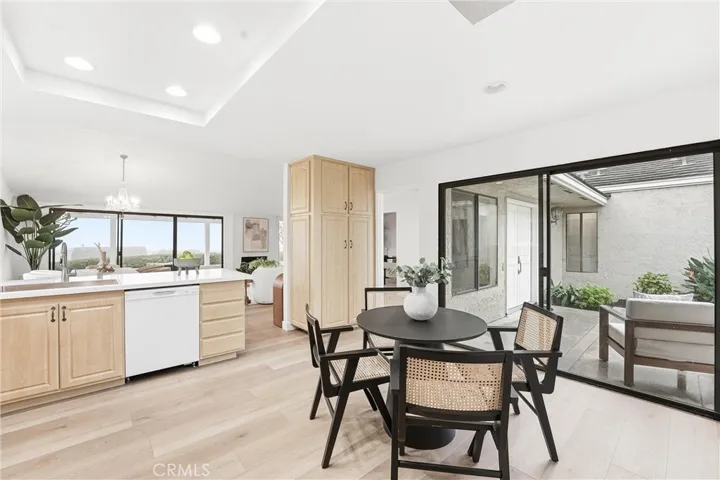 Eat in kitchen with direct courtyard access for indoor outdoor living.