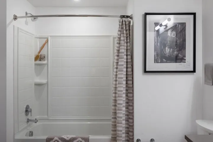 Full bathroom featuring shower / bath combo