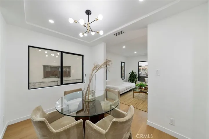 2229 Shoredale updated dining situated between living and kitchen and has a built in cabinet on the opposite side. See next image.