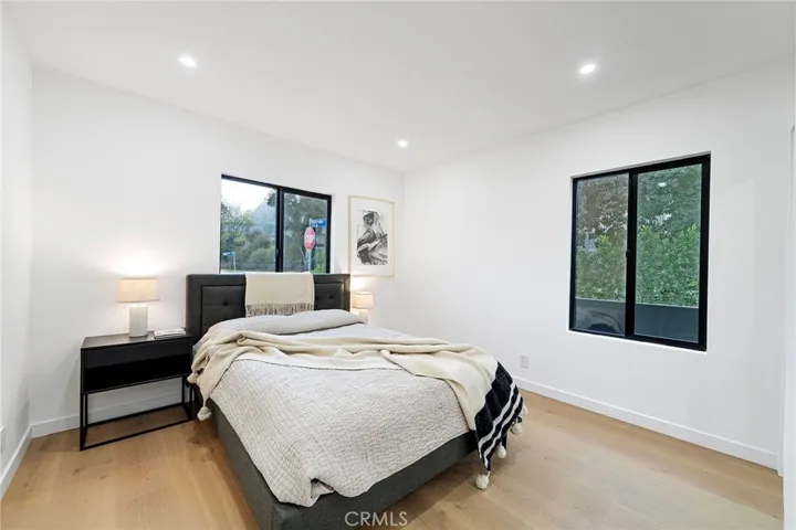 2229 Shoredale updated front bedroom is roomy with mirrored closet doors.