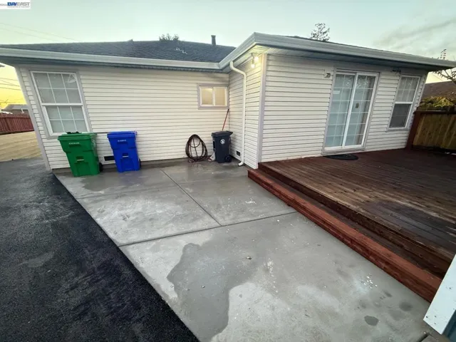 Back of house with Deck