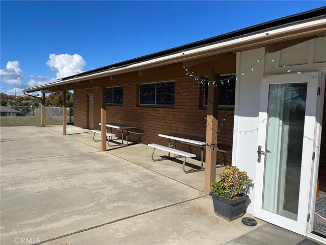 Covered outdoor seating area and main entrance to the Sanctuary.