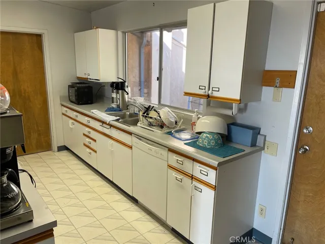 Looking Southeast into the institutional-style kitchen.