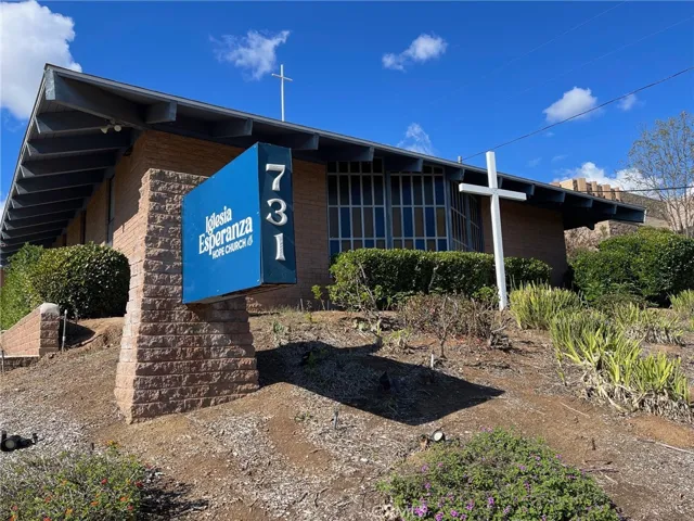 Monument signage at Stage Coach Lane entrance to Subject Property.
