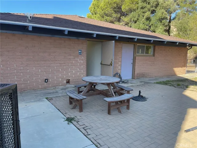 Hardscaped area between the main buildings.