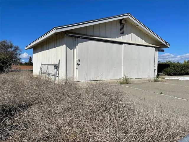 Two car garage/storage building near the Reche Road entrance/exit driveway.
