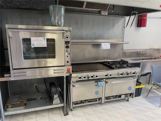 Cooking appliances in the institutional-style kitchen.