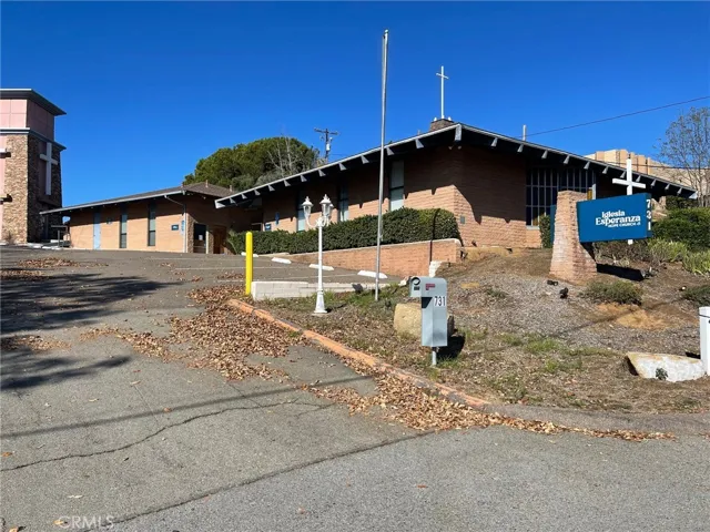 Main entrance/exit on Stage Coach Lane to the Subject Property.