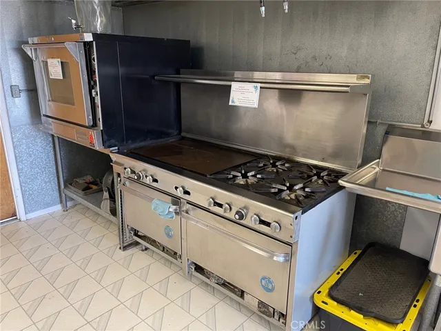 Cooking appliances in the institutional-style kitchen.