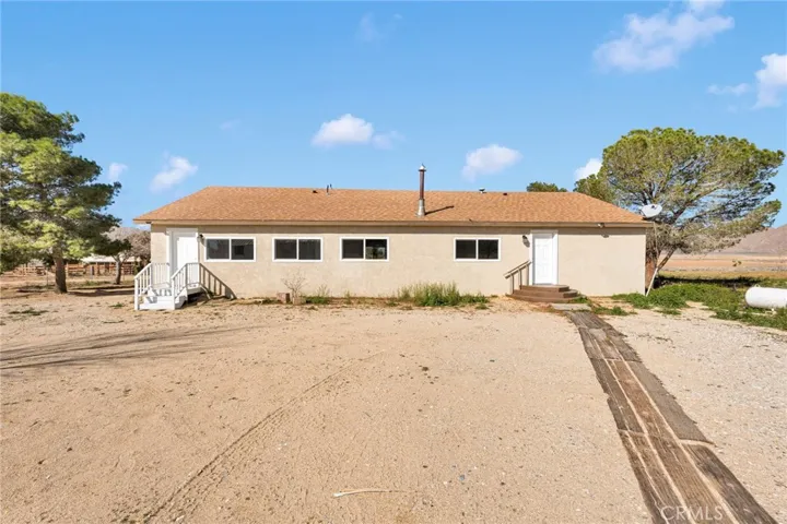 Completely remodeled from top to bottom featuring brand-new flooring, upgraded windows, fresh paint, stylish countertops, and beautifully updated cabinetry throughout.