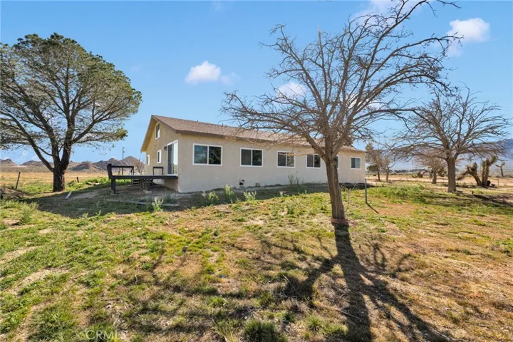 Completely remodeled from top to bottom featuring brand-new flooring, upgraded windows, fresh paint, stylish countertops, and beautifully updated cabinetry throughout.