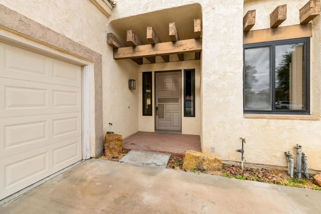Covered Entry + Wood Beams